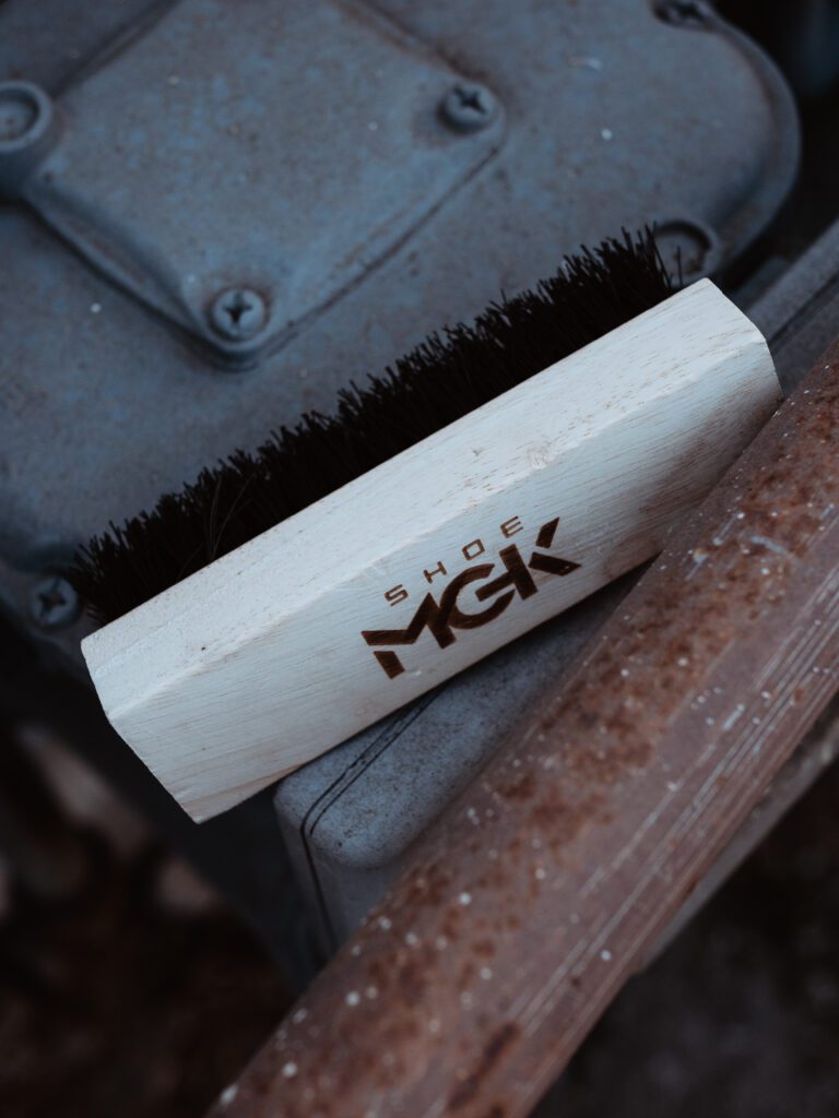 A Shoe MGK branded nylon shoe brush