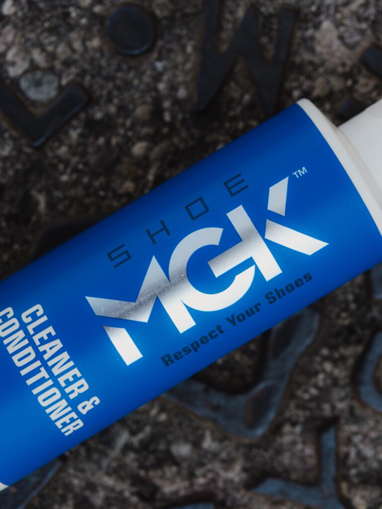 A bottle of the Shoe MGK Cleaner and Conditioner