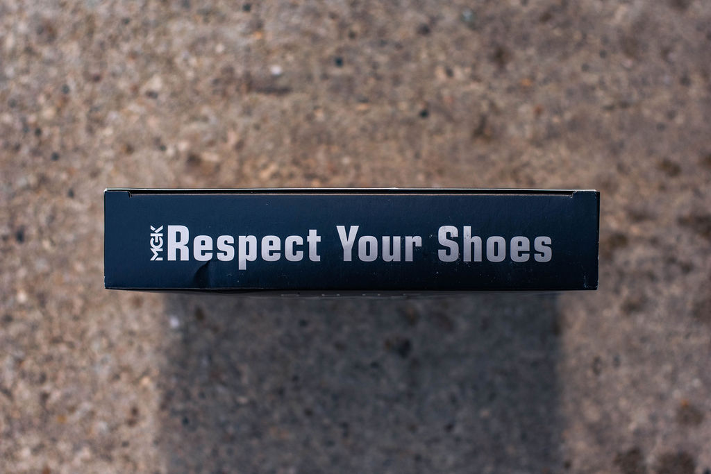 A Shoe MGK product box that reads "Respect Your Shoes"