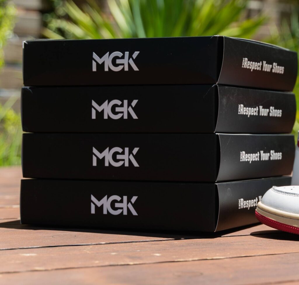 A pile of Shoe MGK boxes