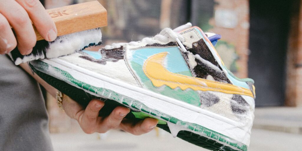 Man cleans Nike Ben and Jerry Dunks