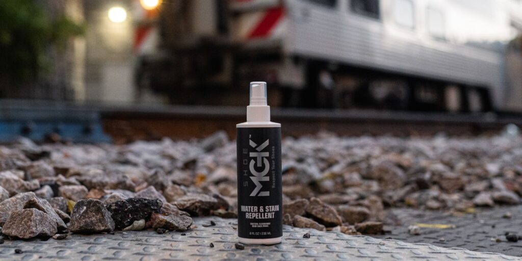 The Water and Stain Repellent in front of a moving train