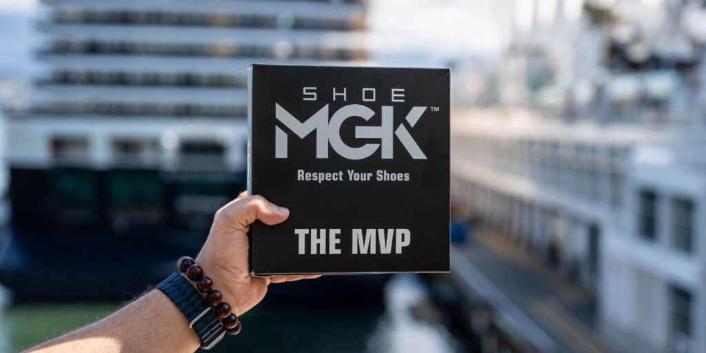 The Shoe MGK Kit Xl in front of a boat for summer
