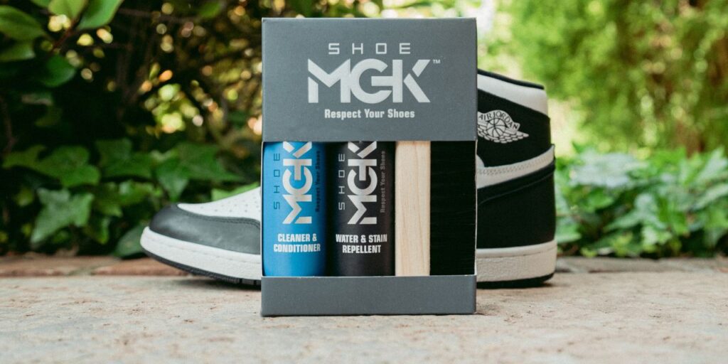 The Shoe MGK Clean and Protect Kit in front of Nike shoes