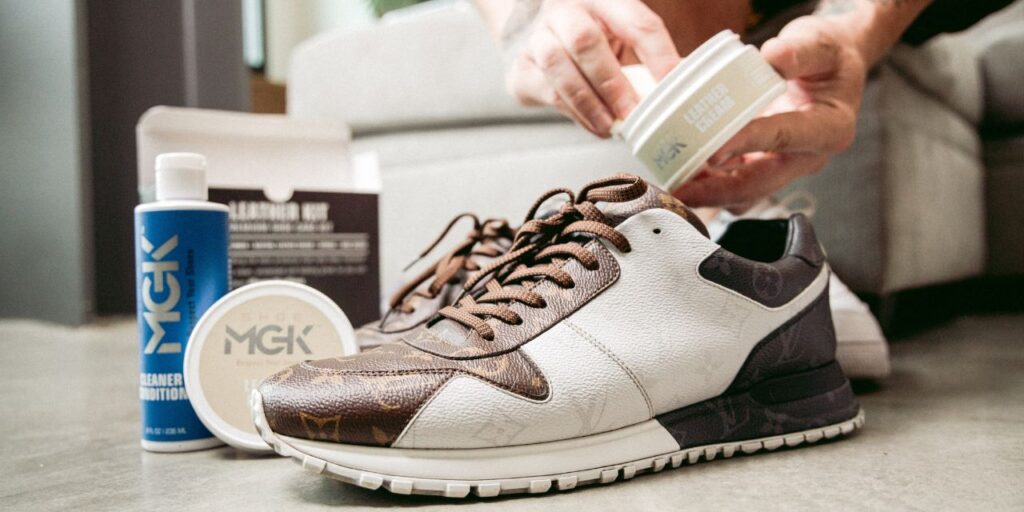 Man cleans nice shoes with the Shoe MGK Leather Care Kit XL